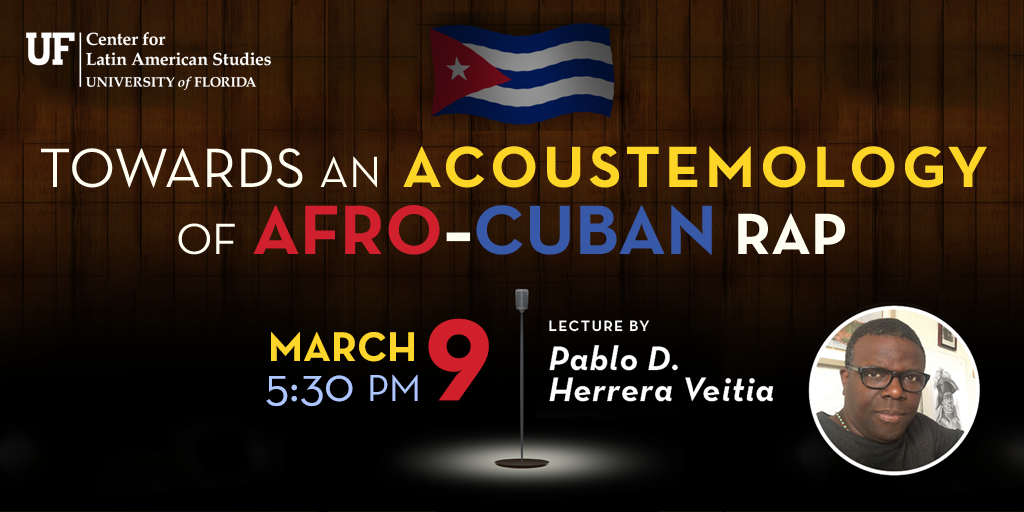 Microphone stand in a spotlight in front of a Cuban flag hanging on a wood panel wall, advertising the upcoming talk on Afro-Cuban rap