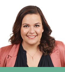 A young woman photographed in a professional headshot